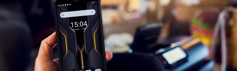 Scanning QR code payment with blurry cashier machine at counter service in coffee shop. Accepted generate digital pay without money. E wallet and cashless technology concept.